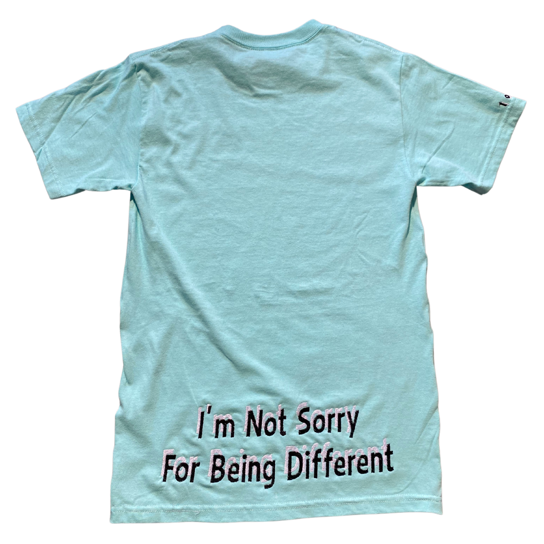 Mint green Unapologetic Youth T-shirt with short sleeves and crew neck, displayed on a plain background.