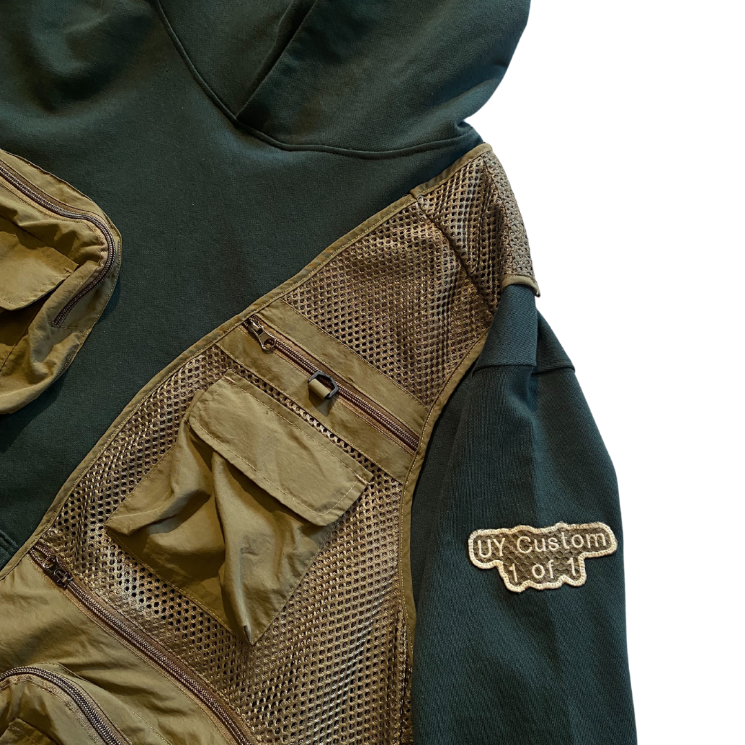 Unapologetic Youth large tactical hoodie with durable fabric, featuring a hood, front pockets, and tactical design details.