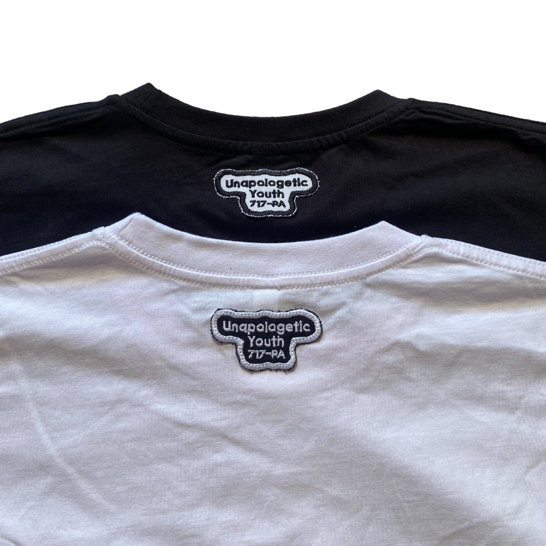 Unapologetic Youth split tee T-shirt with a modern design, featuring a unique split detail on the front.