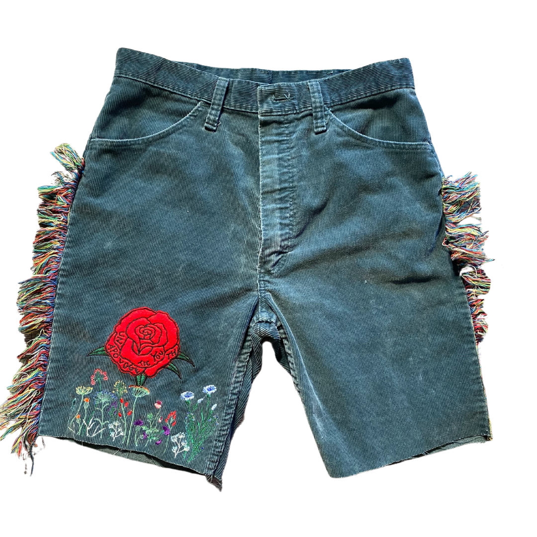 Unapologetic Youth Rose Meadow shorts displayed on a model, showcasing the floral patterned casual summer shorts.
