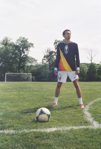 Unapologetic Youth UYFC Away jersey featuring team logo and design, navy blue color with white accents, front view.