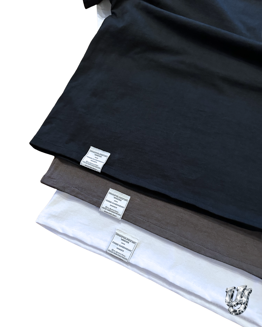 Unapologetic Youth Signature Tee, a stylish casual T-shirt with graphic print, made from soft fabric for comfortable wear.