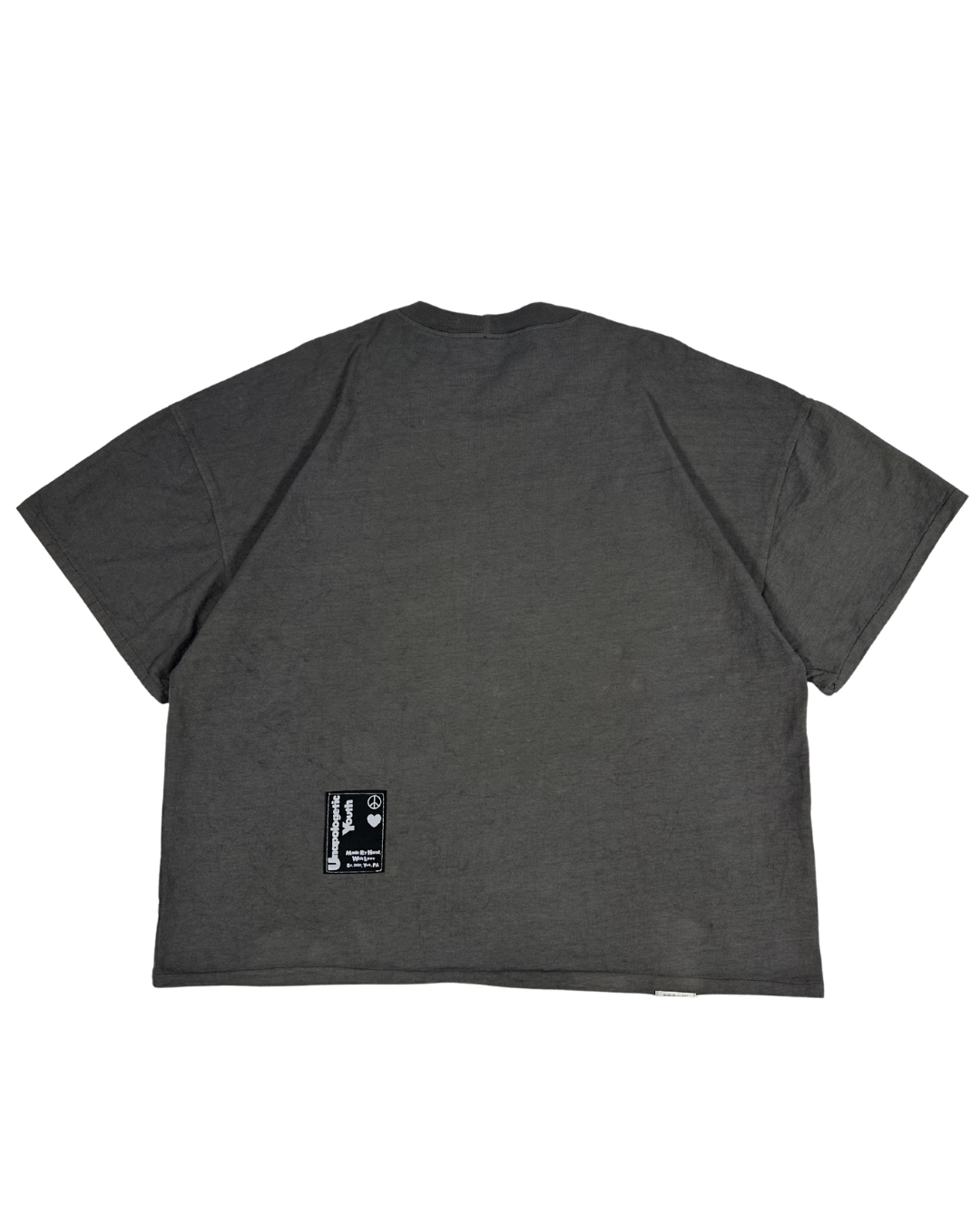 Unapologetic Youth Signature Tee T-shirt in black with bold graphic design, casual fit, and crew neckline.