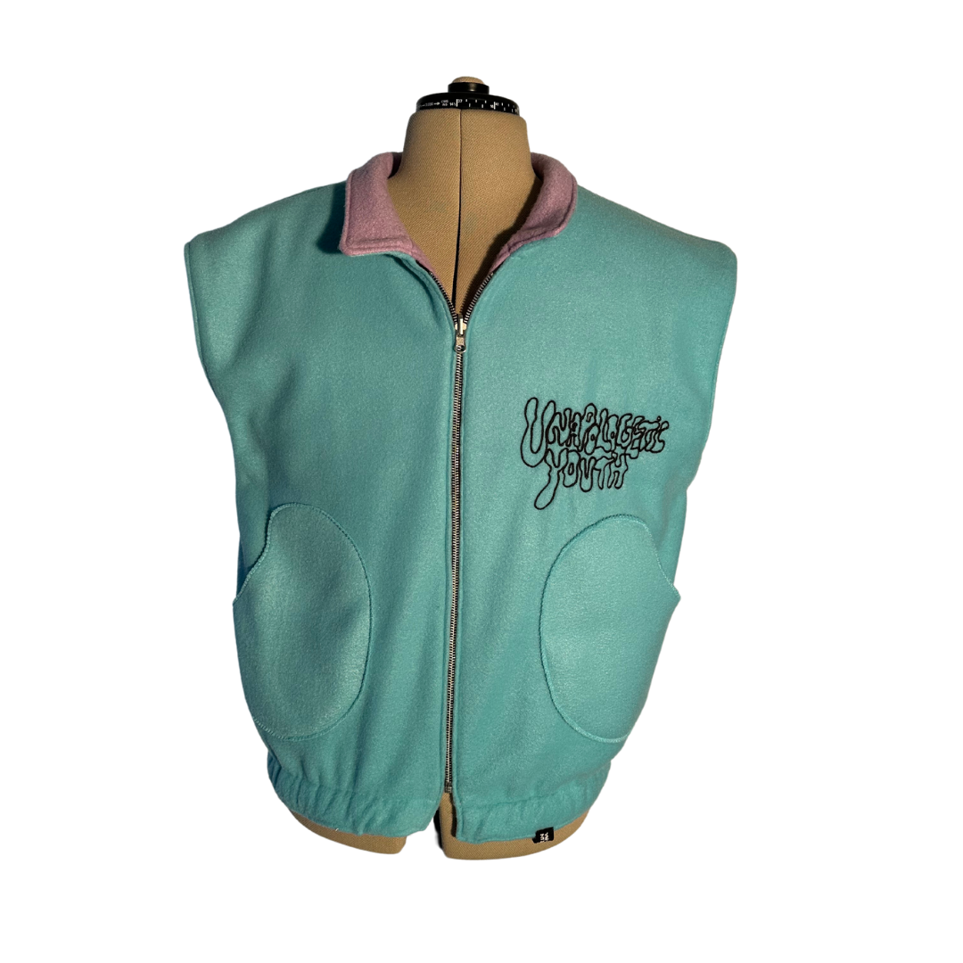 Unapologetic Youth Prevention medium vest with adjustable straps and front pockets, designed for versatile wear and protection.