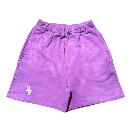 Unapologetic Youth Purple Haze sweatshorts with a relaxed fit, featuring purple fabric and casual drawstring waist.