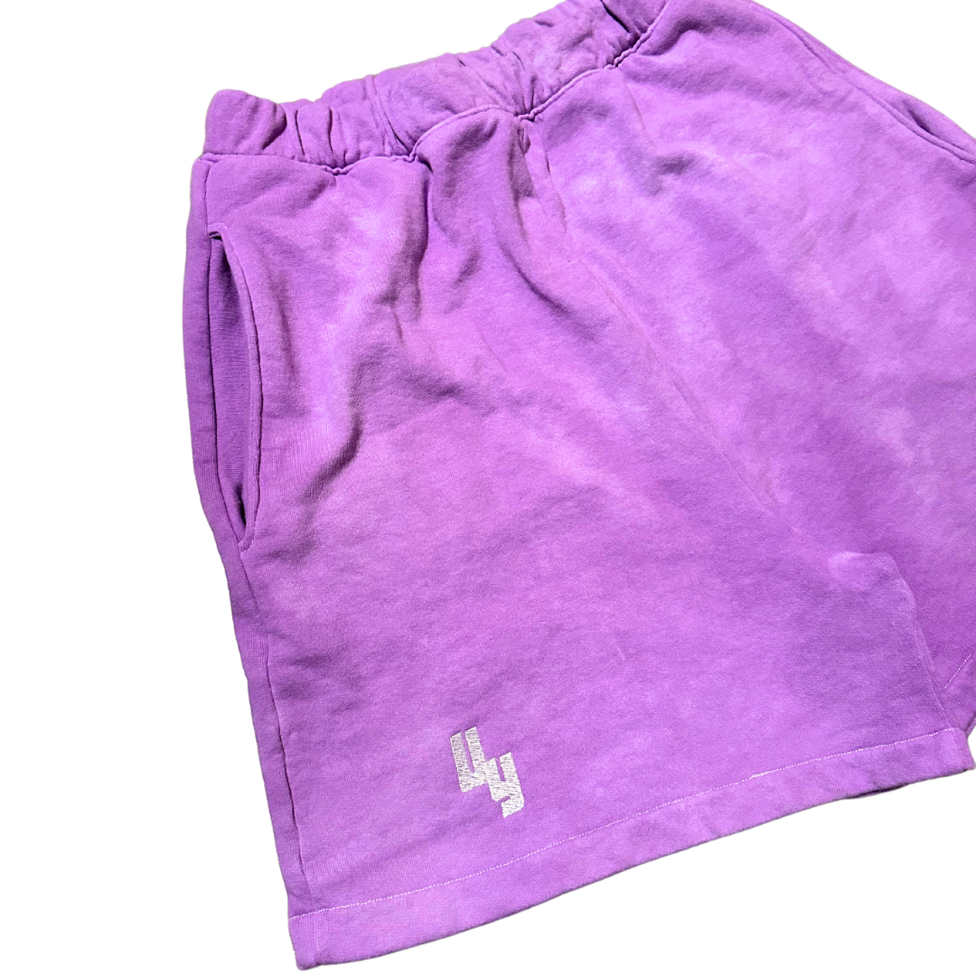 Unapologetic Youth Purple Haze sweatshorts with purple and black tie-dye pattern, comfortable casual shorts for relaxed wear.
