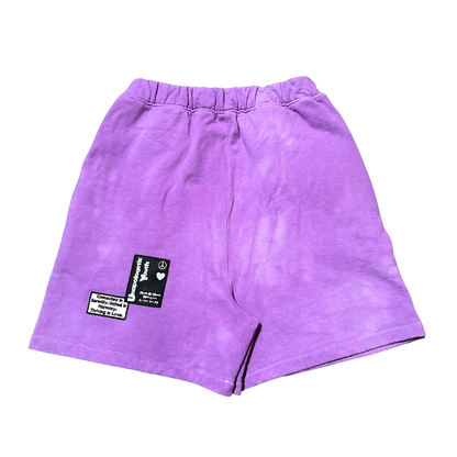 Purple Haze sweatshorts by Unapologetic Youth featuring a vibrant purple color and casual fit, shown laid flat.