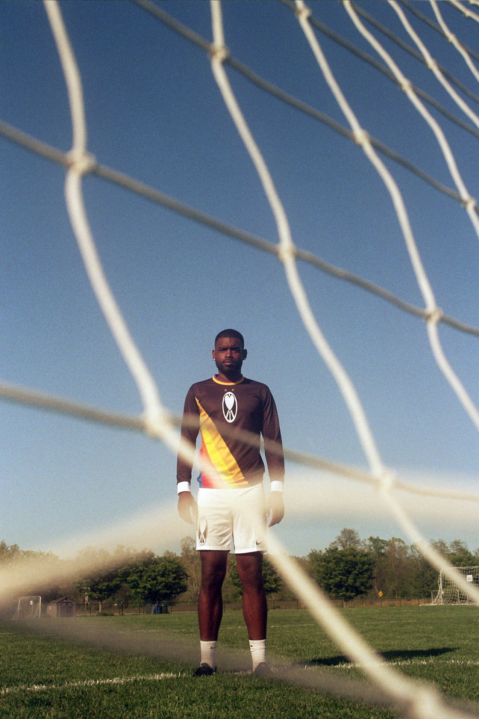 Unapologetic Youth UYFC Away jersey in white with team logo and sponsor details, shown flat on a plain background.