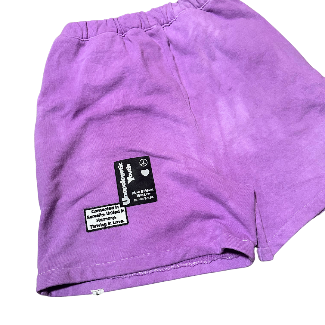 Unapologetic Youth Purple Haze sweatshorts featuring a vibrant purple color and casual fit, displayed on a plain background.