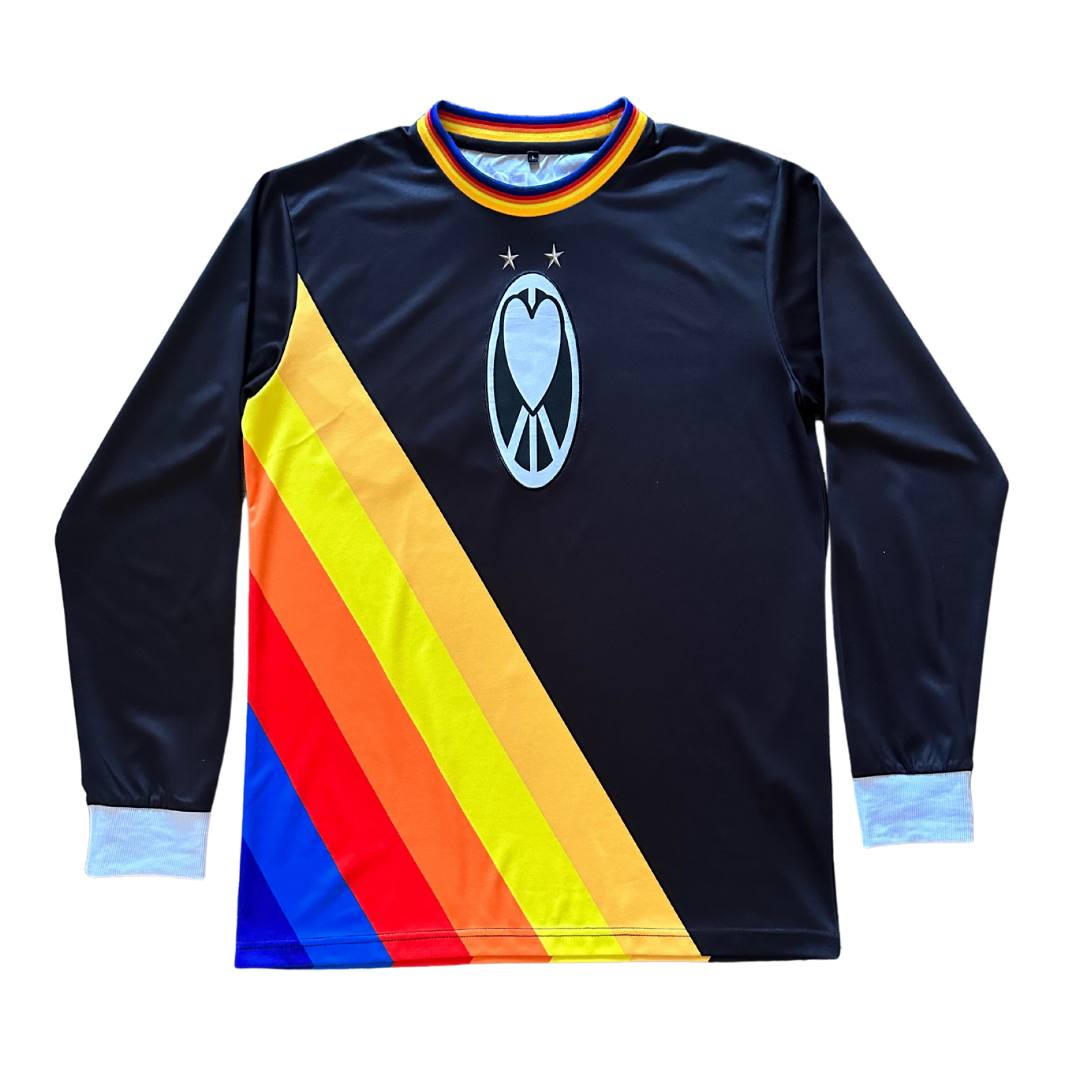 Unapologetic Youth UYFC Away jersey featuring bold team logo and design, white fabric with blue and red accents.