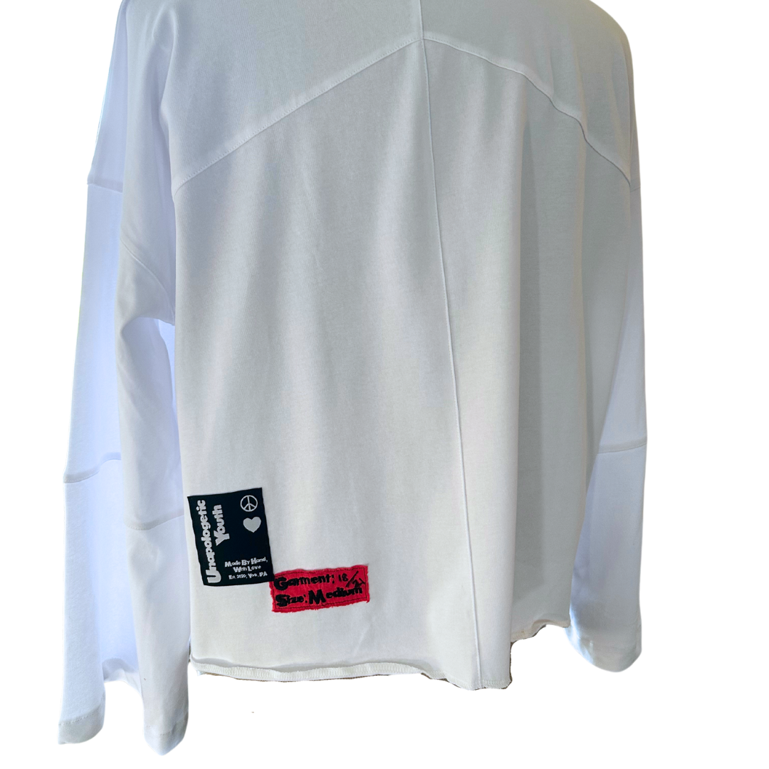 Unapologetic Youth INSFBD flared long sleeve shirt featuring a stylish design and long sleeves on a white background.