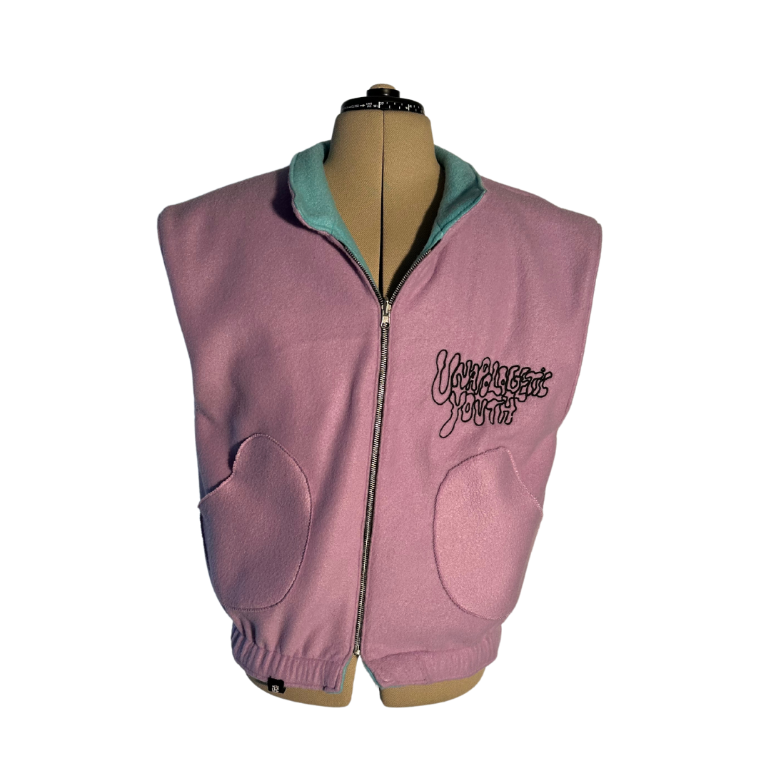 Unapologetic Youth Prevention Medium vest showing a sleek, fitted design with adjustable straps and a neutral color.