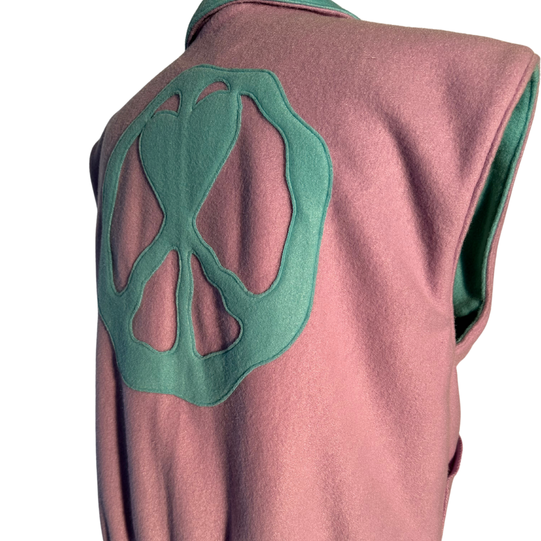 Unapologetic Youth Prevention Medium vest displayed flat, showing its fabric and design details in a neutral setting.