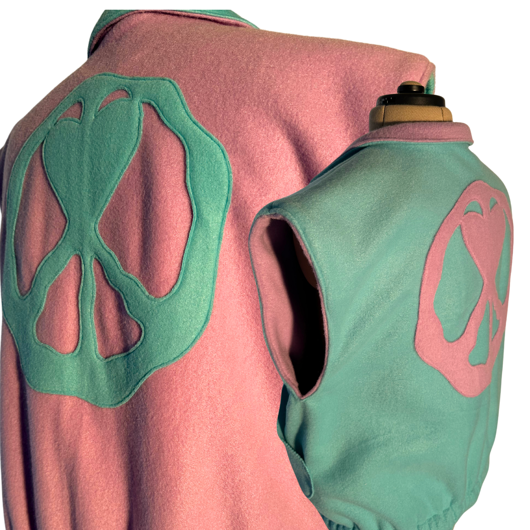 Unapologetic Youth Prevention Medium vest displayed flat, showcasing its fabric and design in neutral tones for safety and protection.