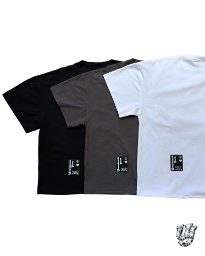 Unapologetic Youth Signature Tee: casual black T-shirt with logo print, made from soft cotton fabric.