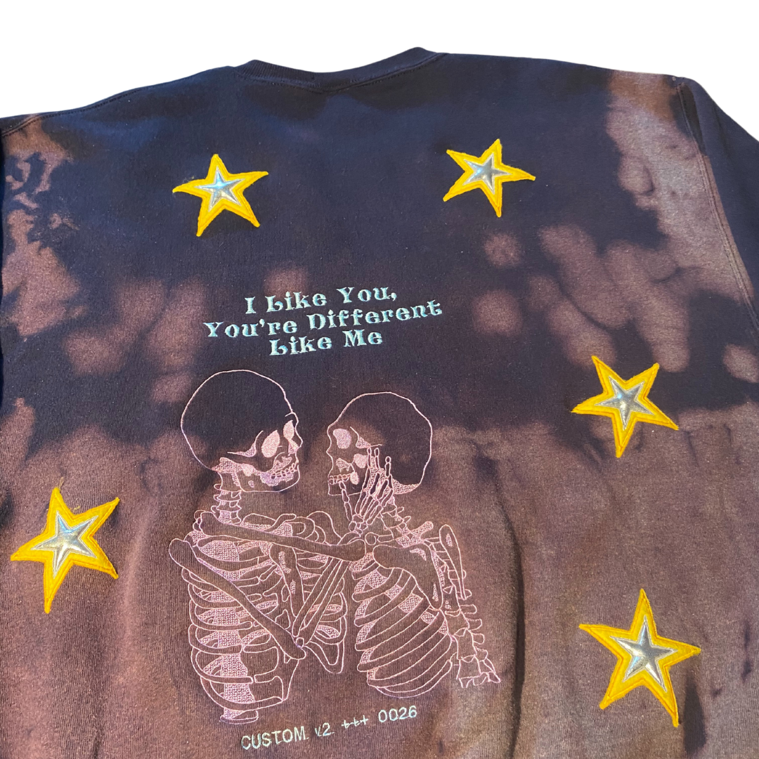 Unapologetic Youth crewneck sweatshirt in black, front view showing plain design and soft fabric texture.