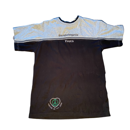 Unapologetic Youth T-Shirt with bold graphic design, casual fit, and soft fabric, displayed on a mannequin.