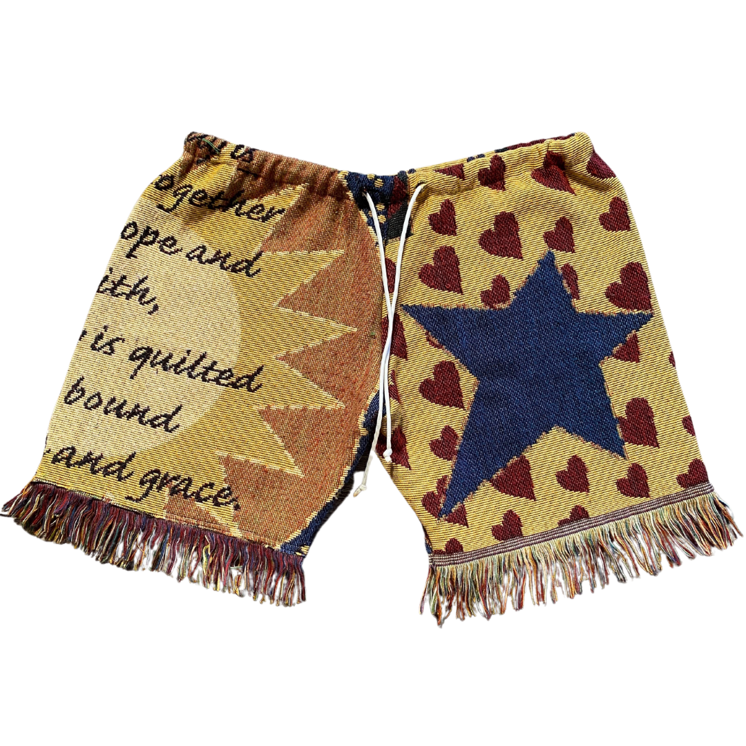Unapologetic Youth Star Child shorts in vibrant colors, featuring star patterns and casual fit, displayed on a neutral background.