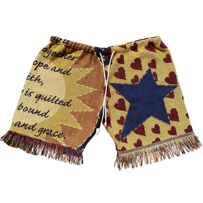 Unapologetic Youth Star Child shorts in vibrant colors, featuring star patterns and casual fit, displayed on a neutral background.