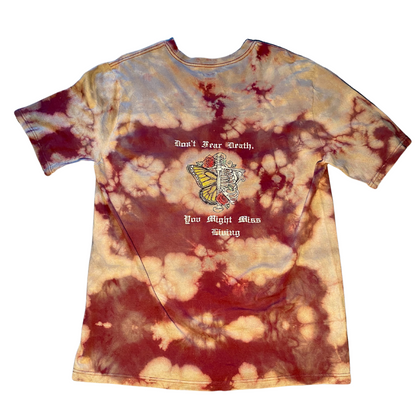 Unapologetic Youth T-Shirt with bold graphic design, white fabric, and classic crew neckline, displayed on a plain background.
