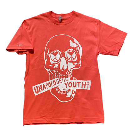 Hot pink Unapologetic Youth T-shirt displayed on a hanger, showcasing the vibrant color and casual style.