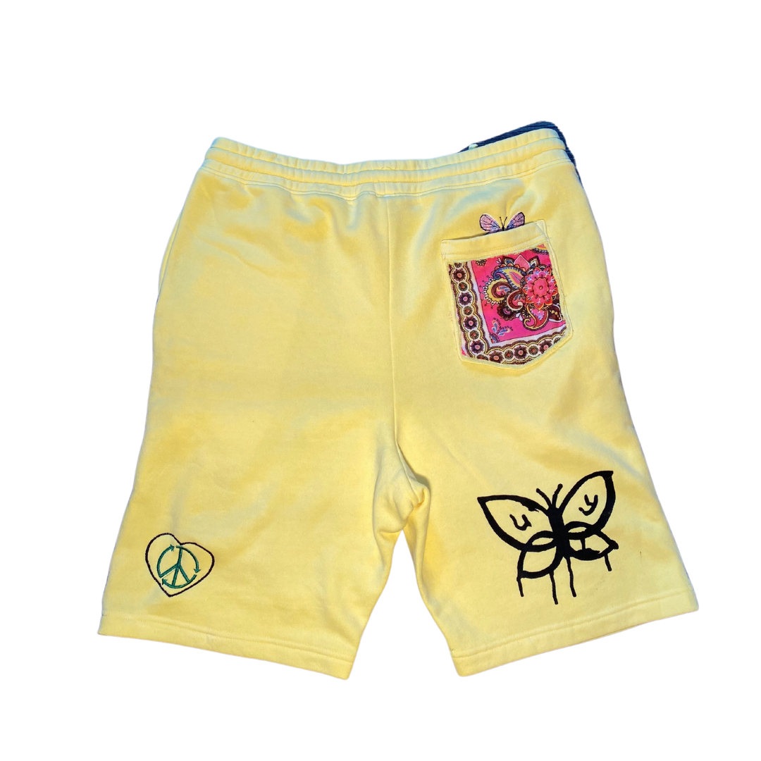 Unapologetic Youth shorts in black with drawstring waist, casual fit, and side pockets, ideal for relaxed everyday wear.