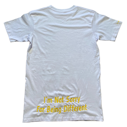Unapologetic Youth green and yellow T-shirt with bold color block design, front view, casual style, in a well-lit setting.