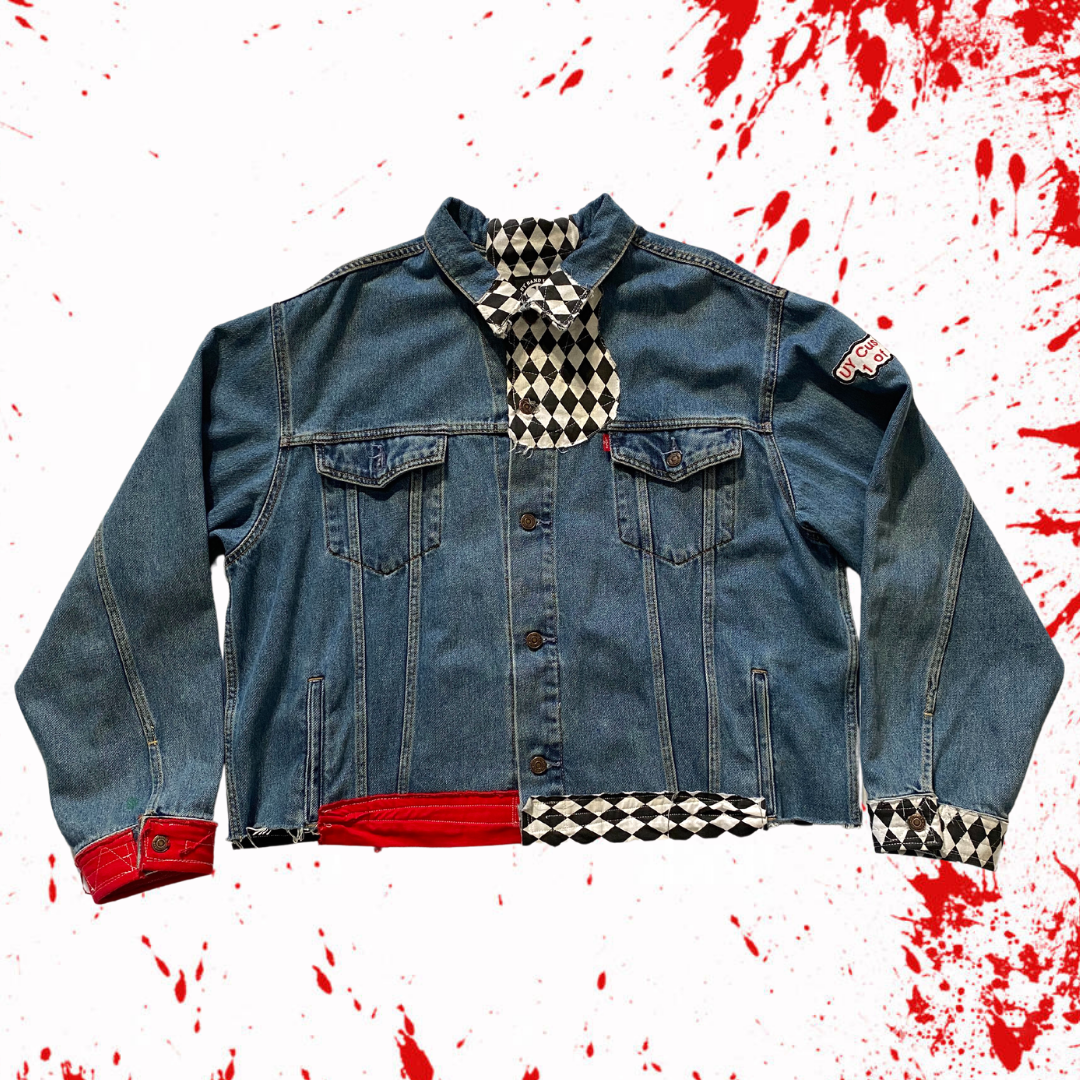 Unapologetic Youth Torn large denim jacket with distressed details and classic fit, styled on a model.