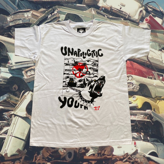 Unapologetic Youth Junkyard T-shirt featuring a graphic print of a scrapyard scene on soft cotton fabric.