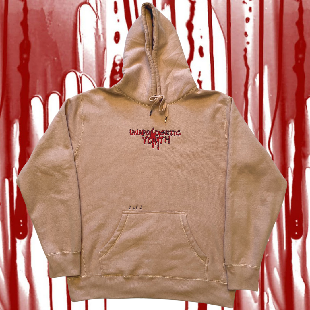 Unapologetic Youth Bleeding Love hoodie featuring a bold graphic print and comfortable fabric in a casual style.