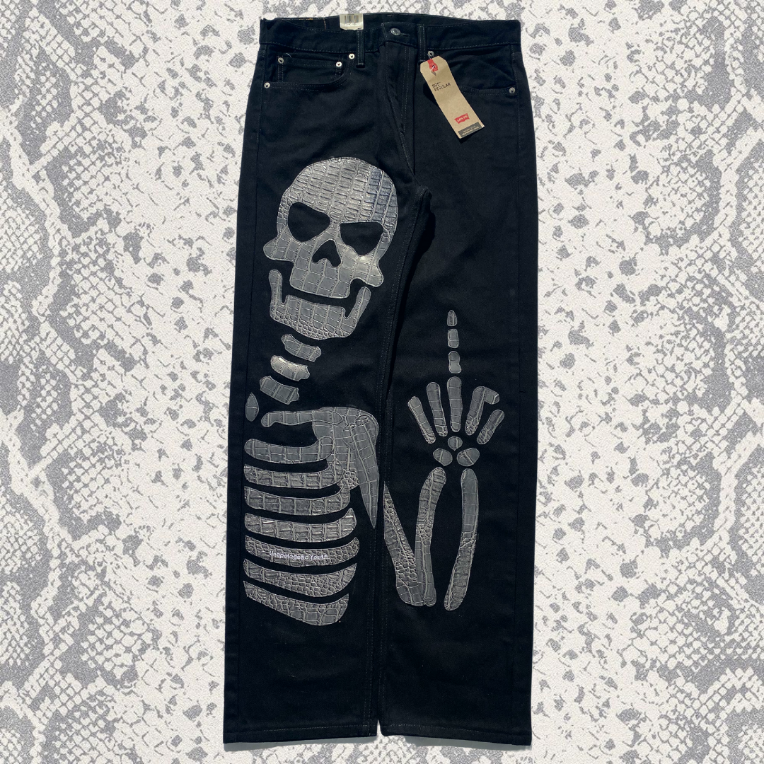 Unapologetic Youth To The Bone jeans in a 1/1 fit, showing denim fabric with distressed details and classic jean styling.