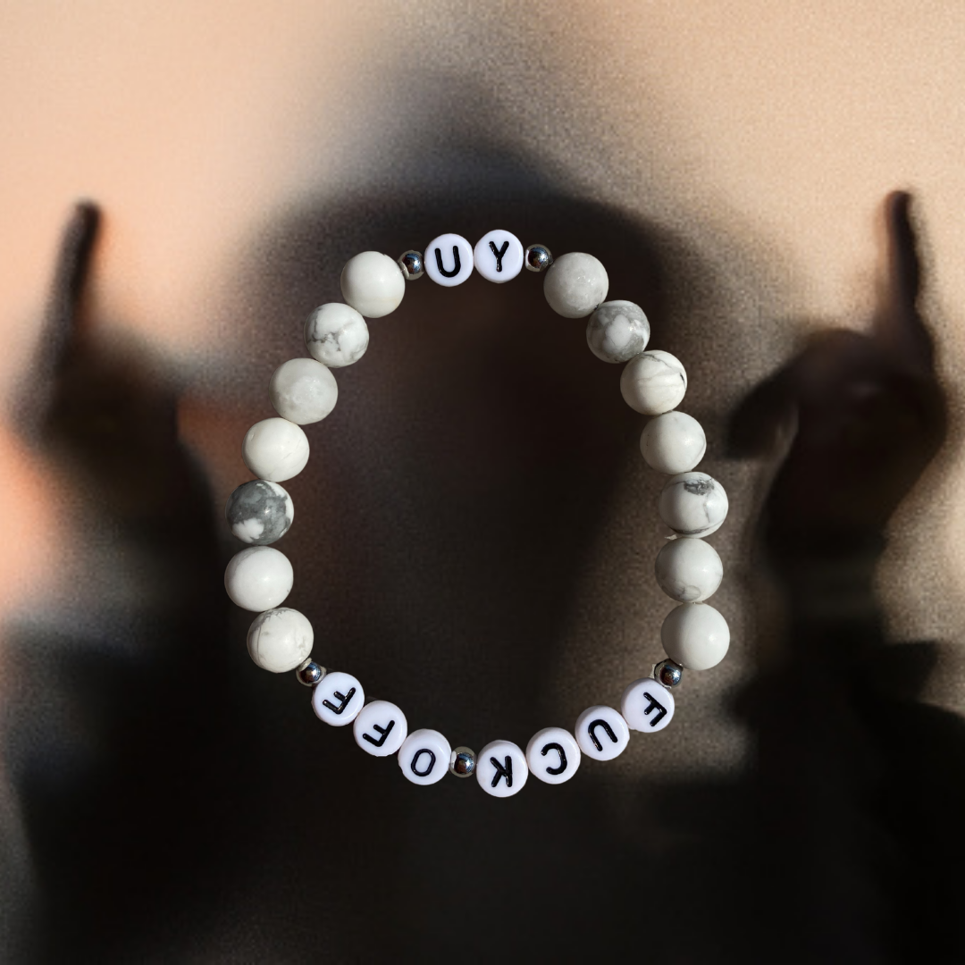 Unapologetic Youth Fuck Off v2 bracelet with bold black band and white lettering, casual accessory for edgy style.