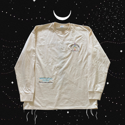 Unapologetic Youth Inner Awakening long sleeve shirt featuring a bold graphic design on black fabric.