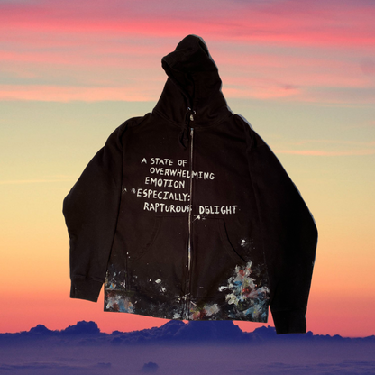 Unapologetic Youth hoodie featuring a comfortable fit with bold graphic design on the front, casual streetwear style.