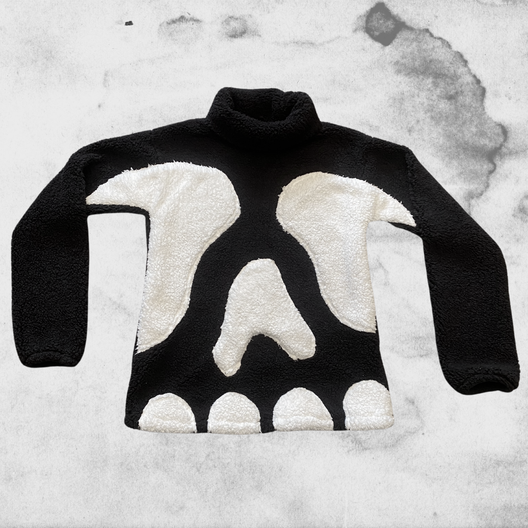 Unapologetic Youth Spooky v1 fleece hoodie featuring a dark, eerie design with ghostly and spooky elements.