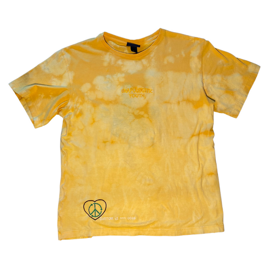 Unapologetic Youth T-Shirt with bold graphic design, featuring a comfortable fit and casual style, shown in a front view.