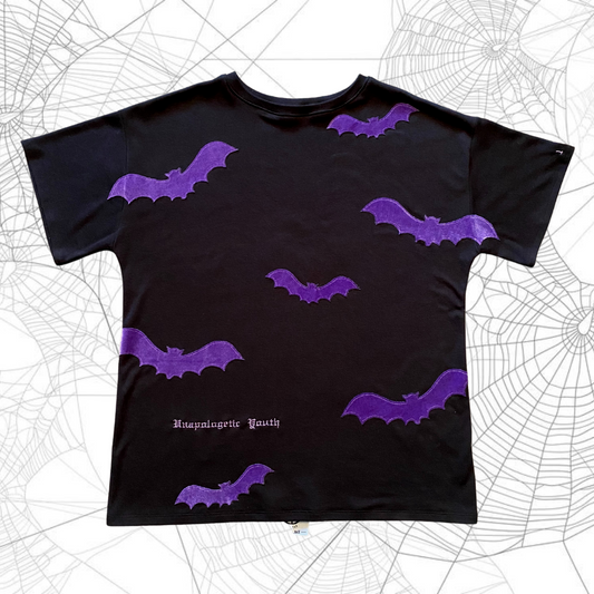 Unapologetic Youth Spooky V2 T-Shirt featuring dark, spooky graphic design on black fabric.