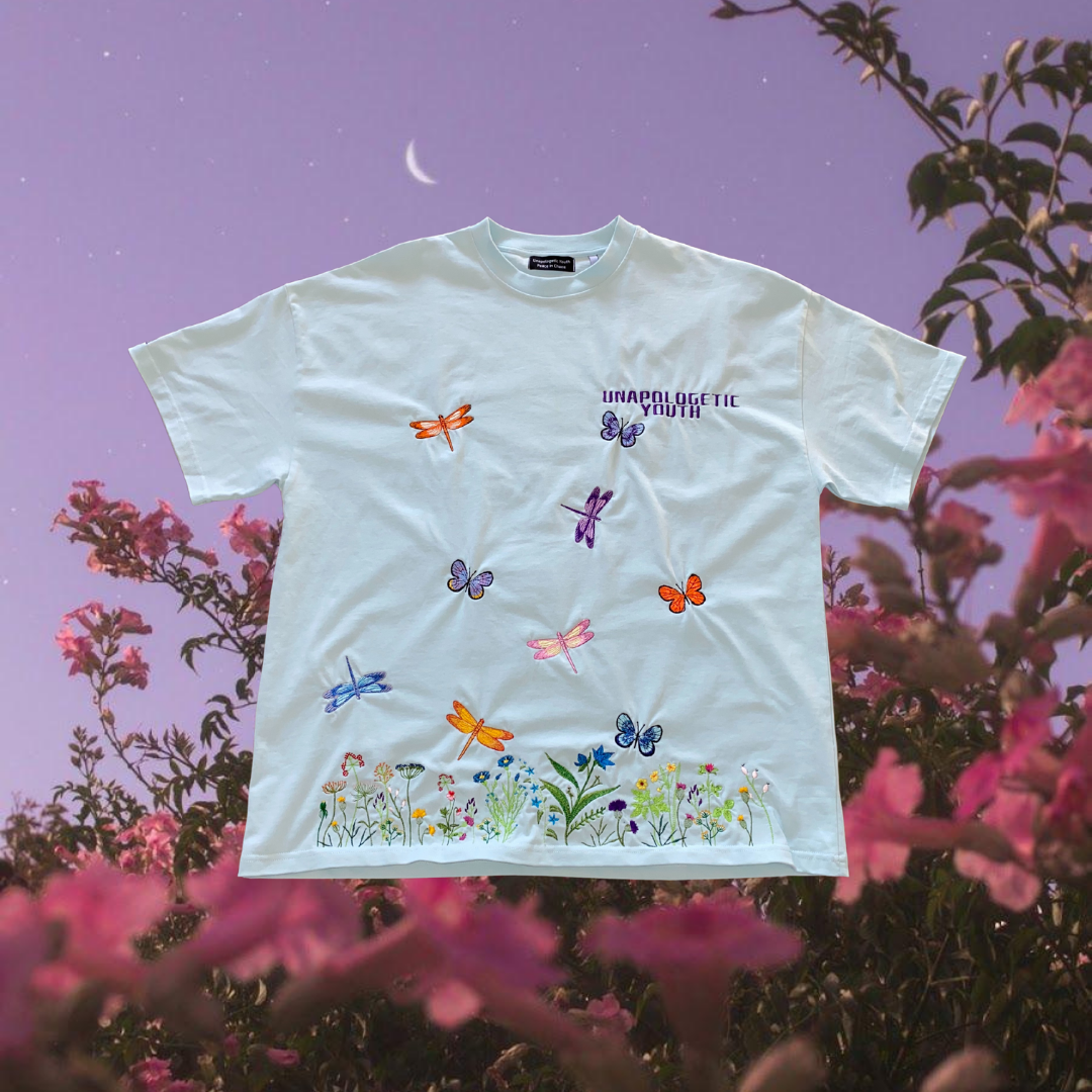 Unapologetic Youth T-shirt with a large wing graphic design on the front, casual and stylish clothing for everyday wear.