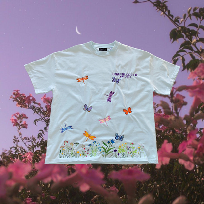 Unapologetic Youth T-shirt with a large wing graphic design on the front, casual and stylish clothing for everyday wear.