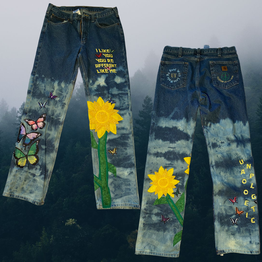 Unapologetic Youth denim jeans featuring a classic fit with visible stitching and five-pocket design.
