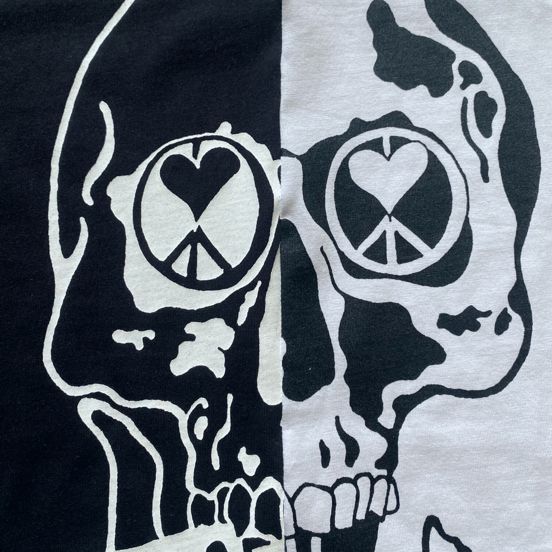 Unapologetic Youth split tee T-shirt with unique design, featuring bold graphics and a relaxed fit, casual streetwear style.