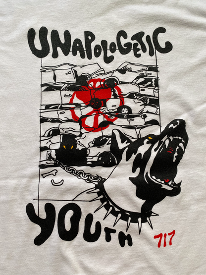 Unapologetic Youth Junkyard T-shirt featuring a graphic print of a gritty junkyard scene on the front.