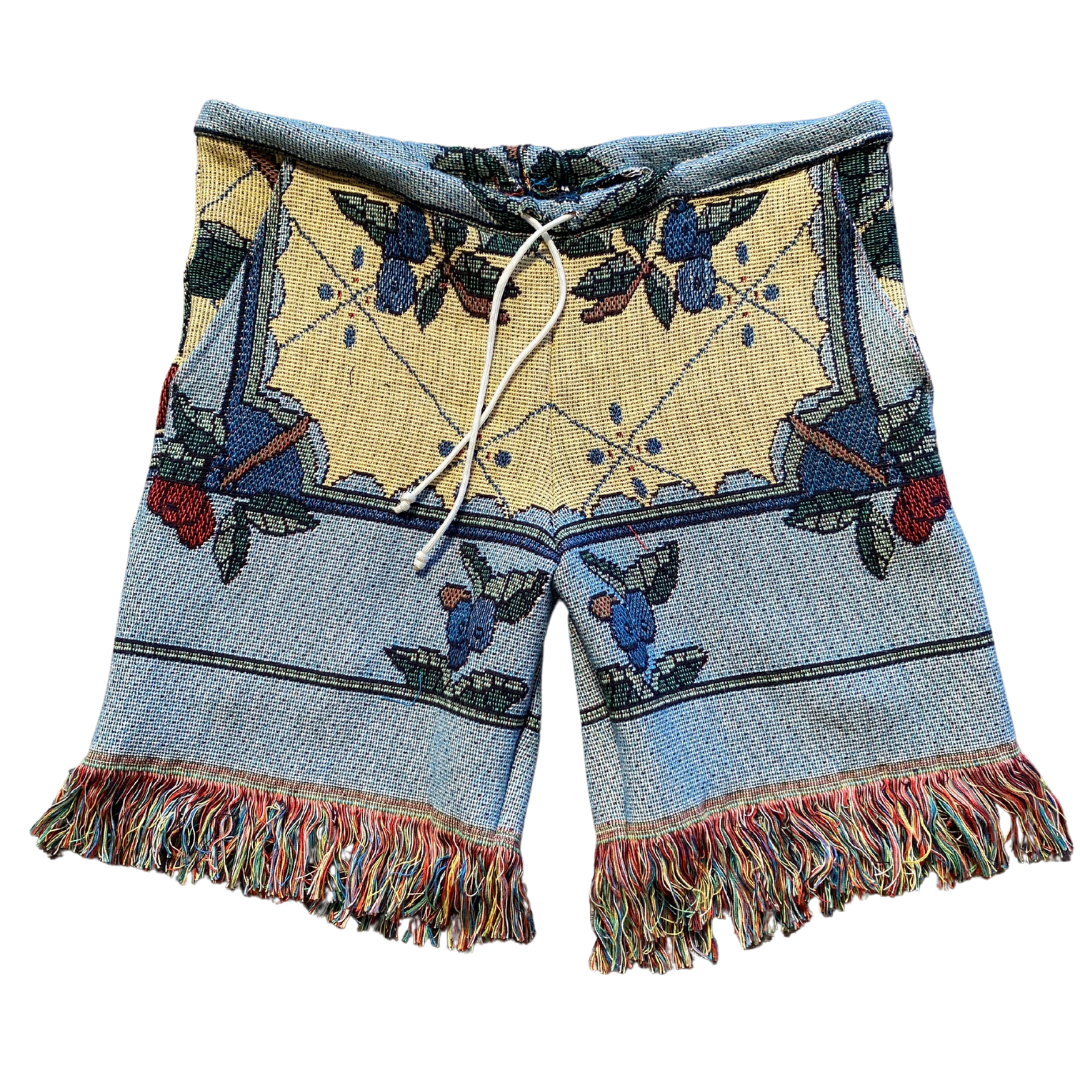 Unapologetic Youth Flower Boy shorts featuring a vibrant floral pattern and casual fit, perfect for summer wear.