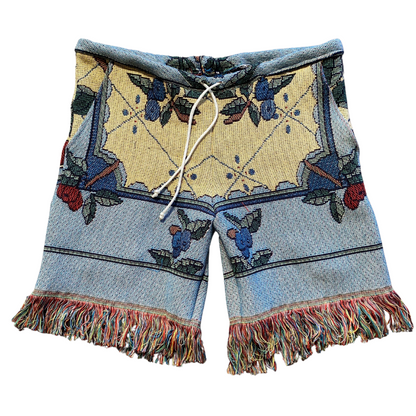 Unapologetic Youth Flower Boy shorts featuring a vibrant floral pattern and casual fit, perfect for summer wear.