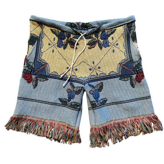 Unapologetic Youth Flower Boy shorts featuring a vibrant floral pattern and casual fit, perfect for summer wear.