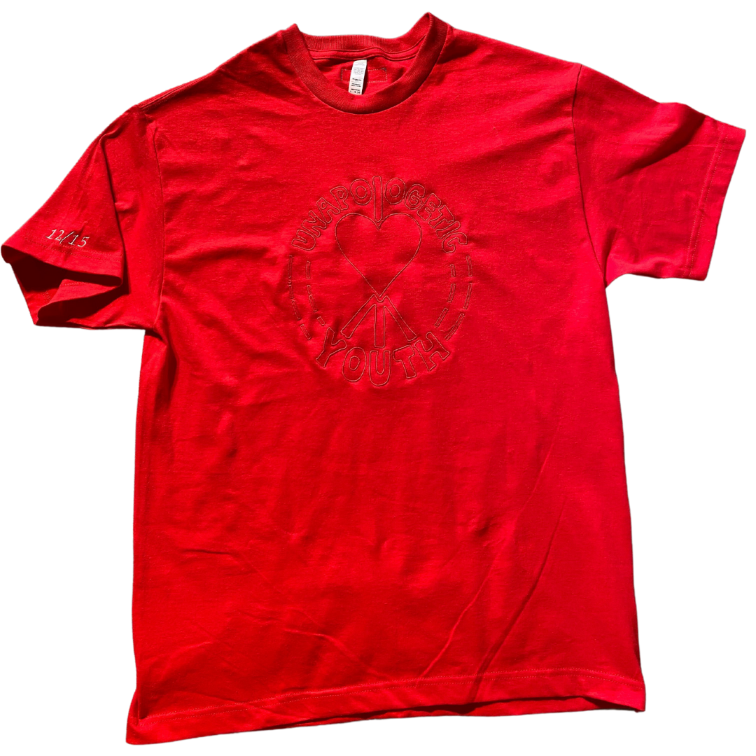 Large Unapologetic Youth T-shirt in black, featuring bold graphic design on soft cotton fabric.