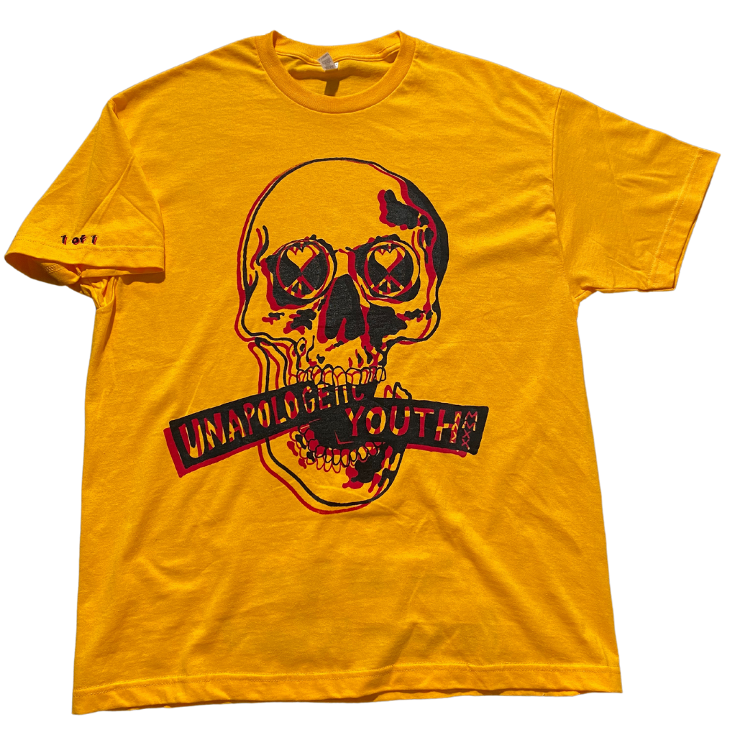 Golden yellow Unapologetic Youth T-shirt with a relaxed fit, displayed on a white background.