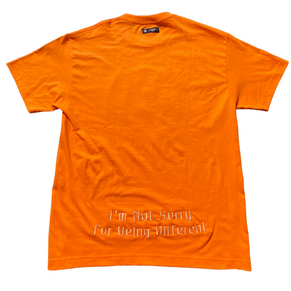 Large Unapologetic Youth T-Shirt, casual fit with bold graphic design, displayed on a neutral background.