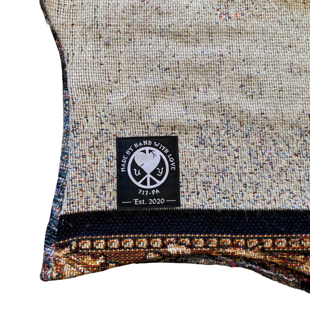 Unapologetic Youth black balaclava covering head and neck, made of stretchy fabric for warmth and comfort.