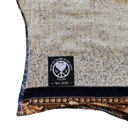 Unapologetic Youth black balaclava covering head and neck, made of stretchy fabric for warmth and comfort.